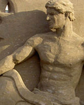 Sand sculpture of a man gazing upward entered into the Solo Division