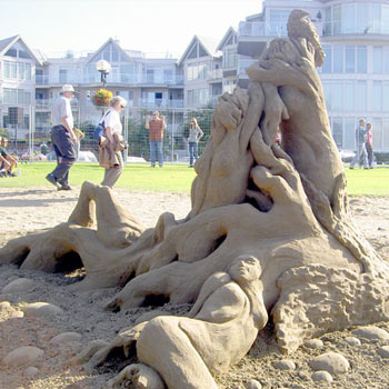 Abstract sculpture resembling people melting together