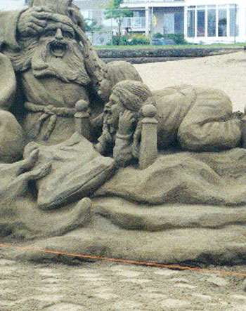 Abstract sculpture of a women and a man crying