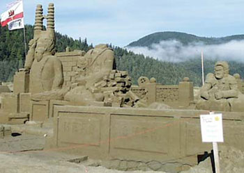 Sculpture of a man, possibly in the military, standing next to a headless man