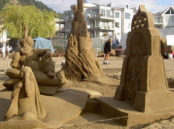 Abstract sculpture of a man and women in front of a shrine