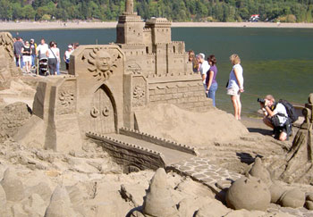 Sculpture of a castle protected by a large moat